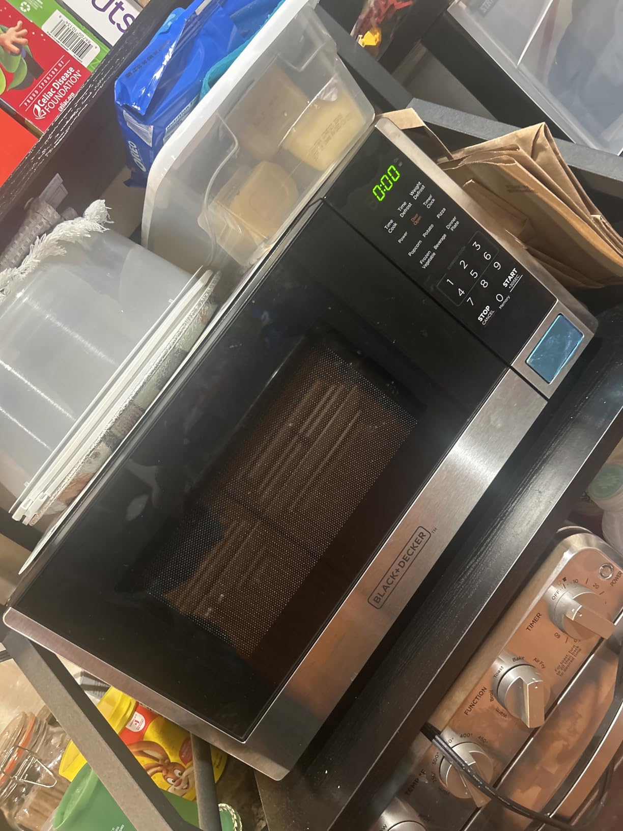 BLACK+DECKER Digital Microwave Oven with Turntable Push-Button Door, Child Safety Lock, Stainless Steel, 0.9 Cu Ft - Customer Photo 2